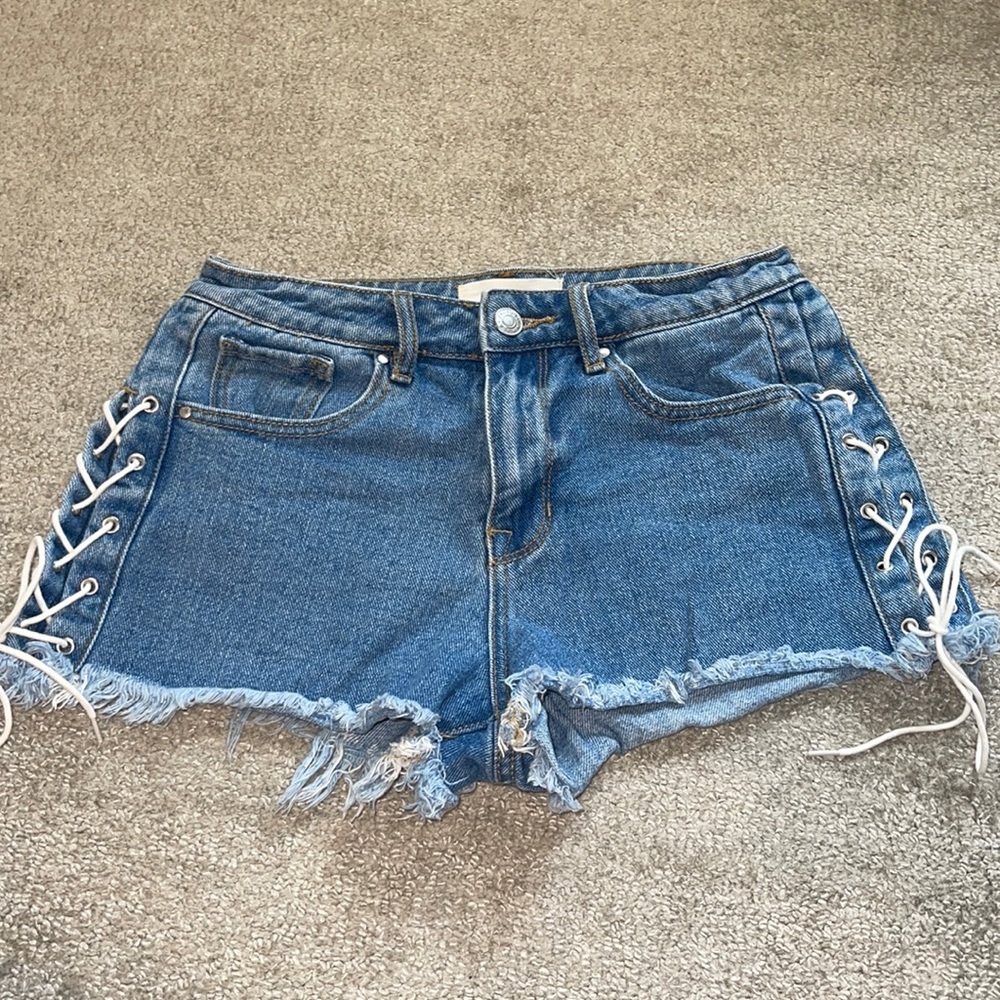 Pacsun high rise Jean shorts size 25 with lace up sides